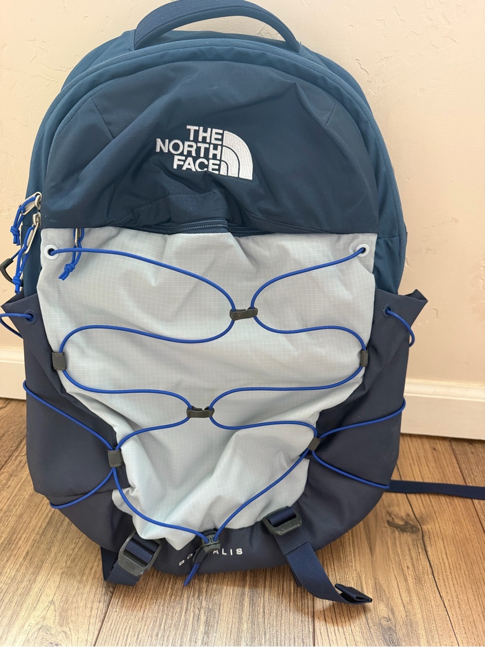 The North Face Borealis Backpack in Navy and Light Gray with Blue Bungee